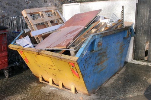 Professional team performing loft clearance in Pinner